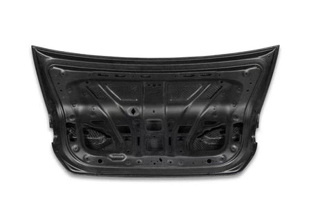 Black car trunk lid replacement part for BMW 5 Series G60/G68, shown from the underside on a white background.