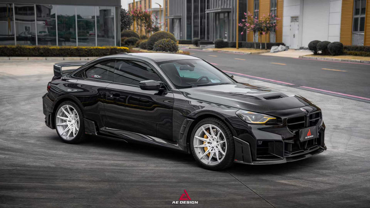 AE Design BMW M2 G87 carbon fibre side fenders front three quarter