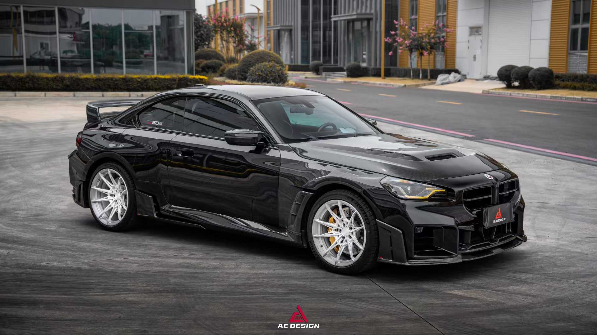 AE Design BMW M2 G87 carbon fibre side fenders front three quarter