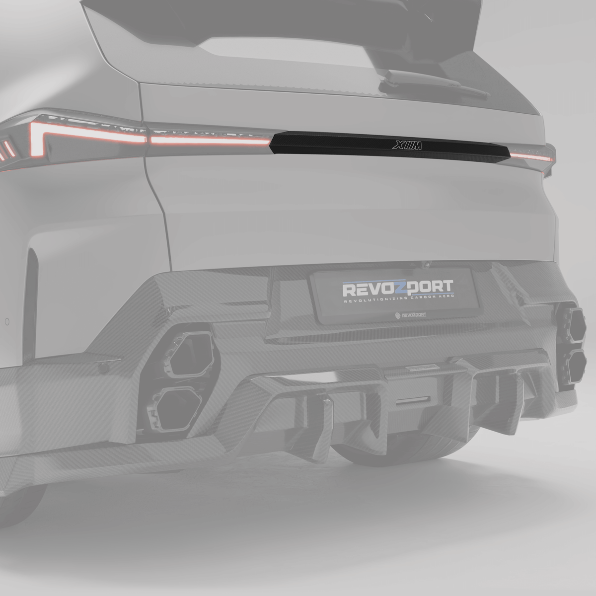 RevozPort BMW XM G09 carbon fibre tailgate trim close up