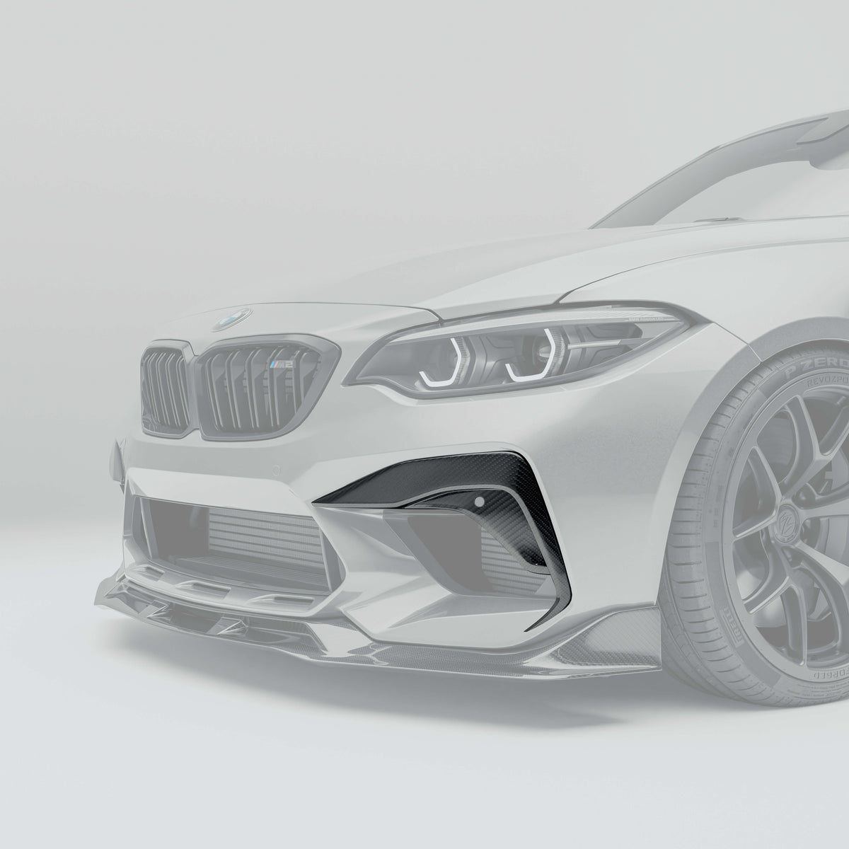 RevoZport BMW M2 Competition F87 carbon fibre bumper insert side view