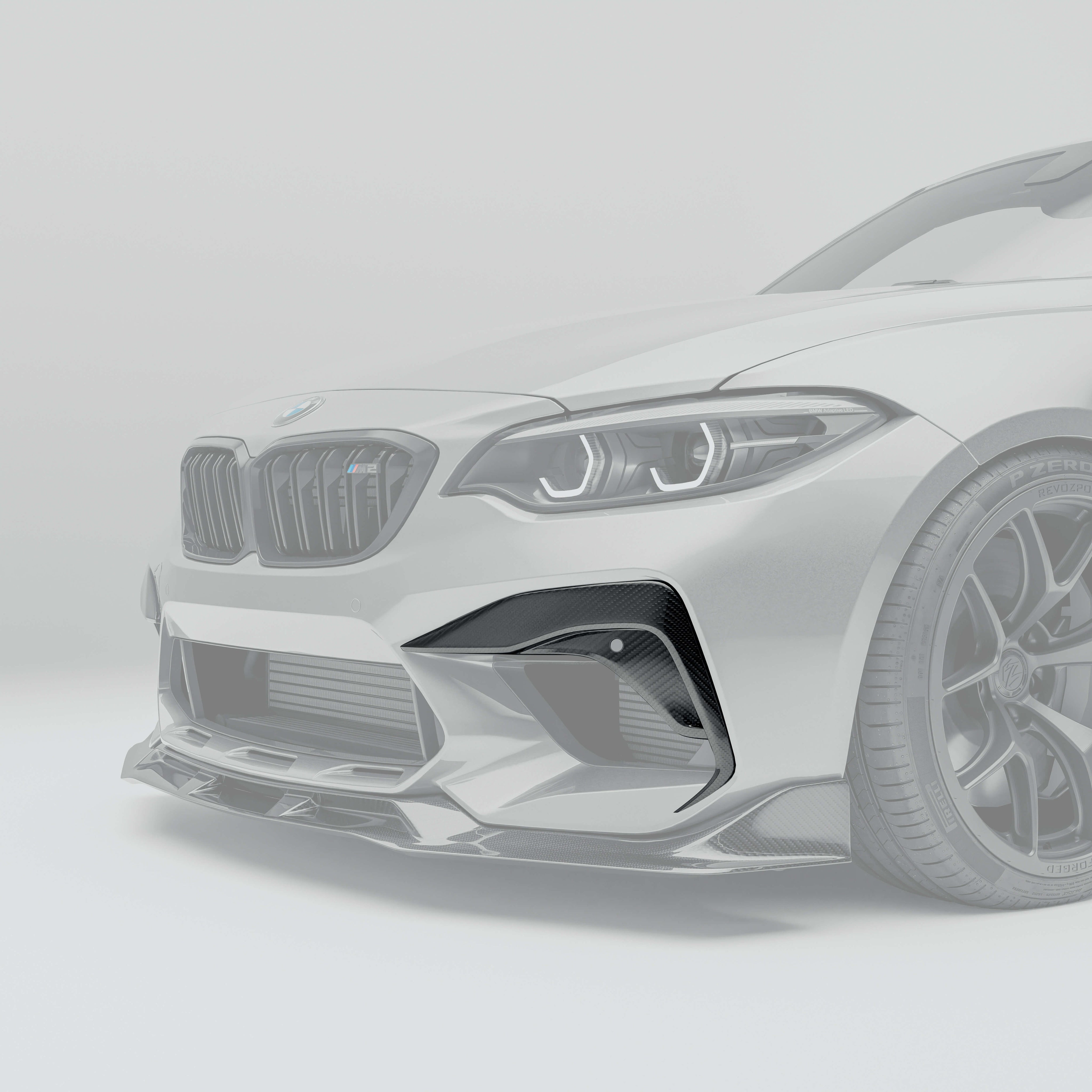 RevoZport BMW M2 Competition F87 carbon fibre bumper insert side view