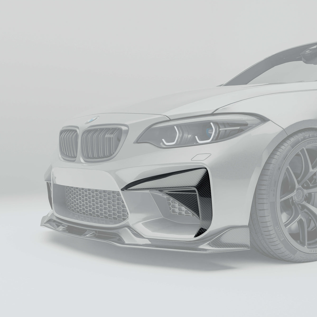 RevoZport BMW M2 F87 N55 carbon fibre bumper insert close-up weave detail
