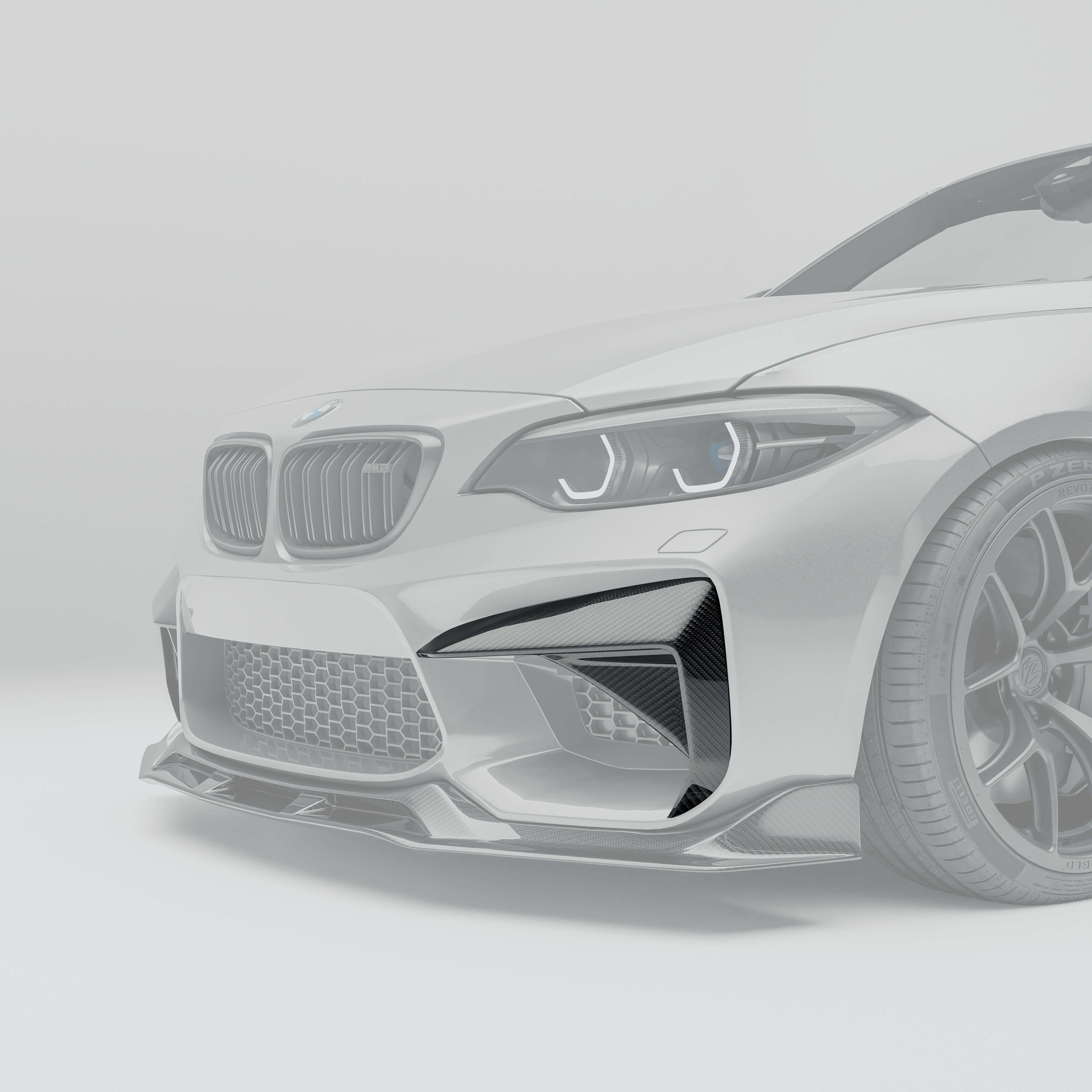 RevoZport BMW M2 F87 N55 carbon fibre bumper insert close-up weave detail