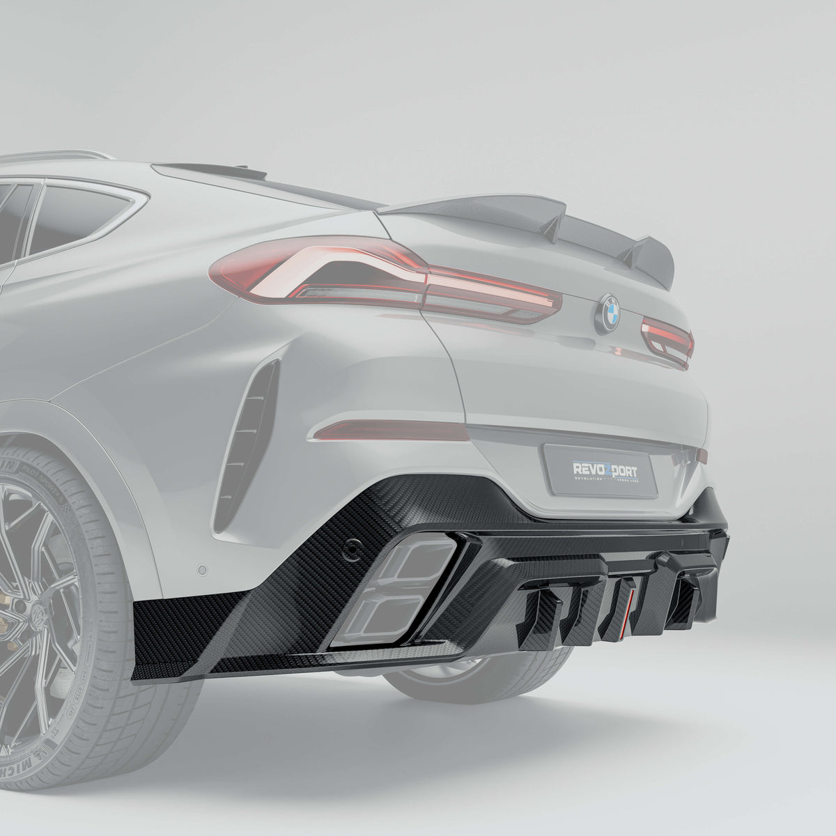 RevozPort BMW X6 G06 carbon fibre rear diffuser close up
