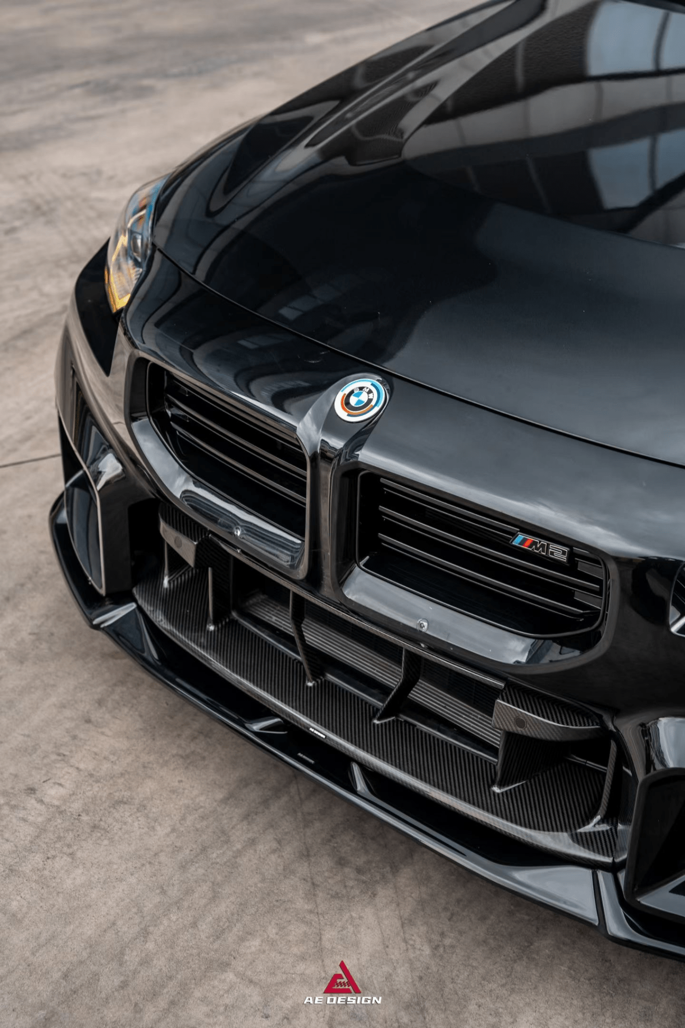AE DESIGN - BMW M2 G87 GLOSS BLACK FRONT LIP - Aero Carbon UK