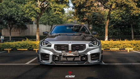 Venom Sport BMW M2 G87 dry carbon fiber front lip fitted, front view