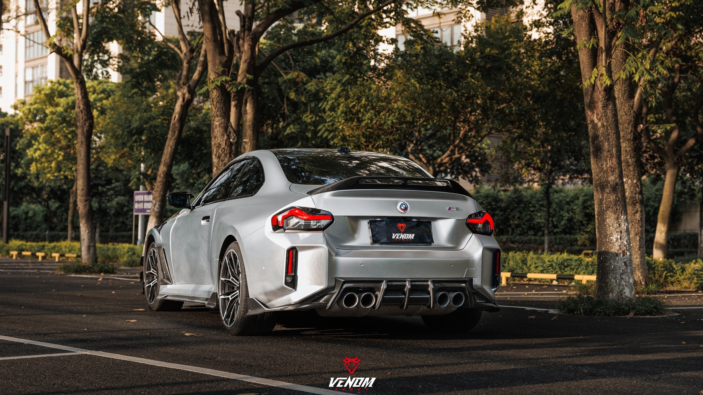 Venom Sport BMW M2 G87 carbon fiber rear diffuser, rear three quarter view
